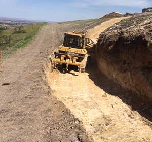 Pat Molnar creating a 2-1 Fill Slope San Luis Obipso County